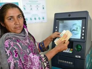 A women recive money form benzir income support program 